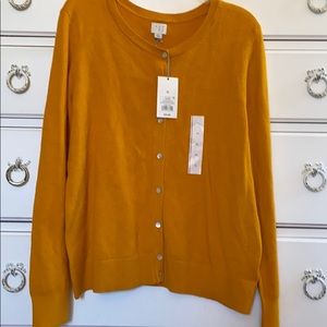 A new day button up sweater